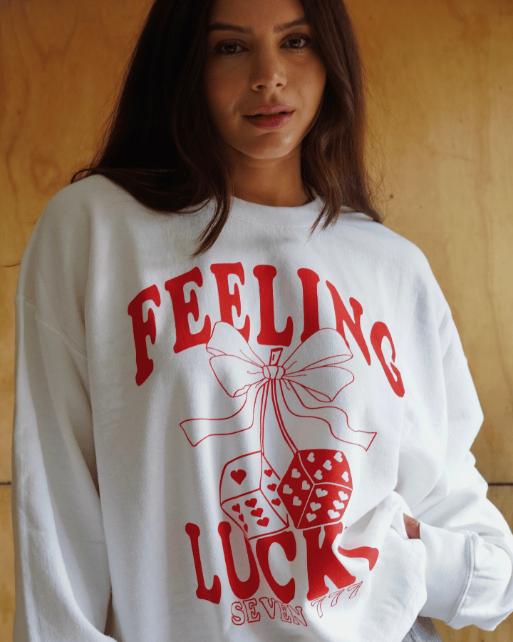 BUZO FEELING LUCKY BLANCO/ROJO